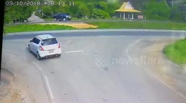 Woman's car flattened by out-of-control truck while waiting at junction