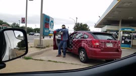 Man dancing at an intersection