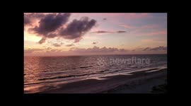 Pastel Sunset with Rain Cloud