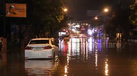 Diners stranded after monsoon turns road into flooded river