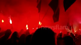 Ukrainian Euromaidan activists march outside the parliament