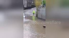 Man wades across flood because he doesn't want to extend morning run