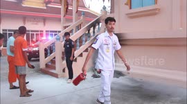 GRAPHIC: Man sets himself on fire at Buddhist temple with pocket full of losing lottery tickets