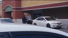 Brit copper extradited to the Caribbean to face rape claims was spotted smiling and joking with local officers