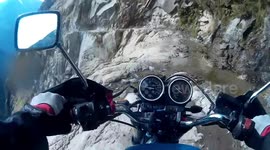 Motorcyclist takes trip on one of the most dangerous 'roads' in the world (Without logos)
