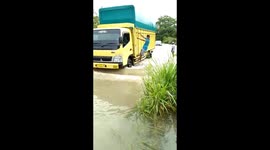 Flood Cover Road and Palm Plantation in Pasaman Barat, West Sumatera, Indonesia