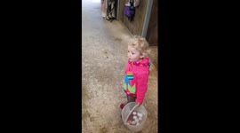 Harriett Platt,  SCID baby, attends to mummy's horse, bad leg. Toddler horse vet