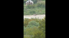 Boat dock floats down river during historic flood in Marble Falls, Texas