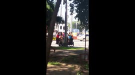 Tricycle overloaded with 12 teenage girls