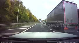 Lorry spins car the wrong way into oncoming traffic!