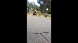 Bloodied and injured North Carolina woman waits on side of street for ambulance