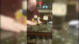 Pub-goer performs incredible trick with pint of Guinness and packet of crisps