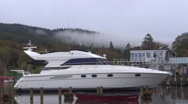 The looming fog over Windermere Lake in Lake District, England, UK