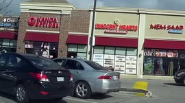 guy won't leave store because dog is standing outside of the door.