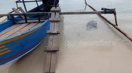 Sail From Mansinam Island to Manokwari using Traditional Motorboat