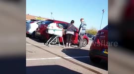 Couple hilariously attempt to unlock the wrong car as their own identical vehicle sits two spaces away