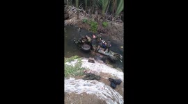 Soldiers try to save jeep after crashing into ditch