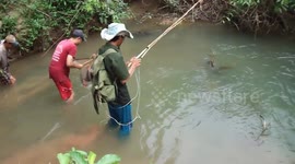 Killing fish by shocking with Electricity in the remote of Village