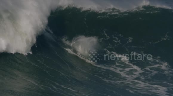 British Surfer has a Massive Wipeout off Nazaré, Portugal