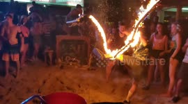 Full moon party revellers FAIL at flaming skipping rope