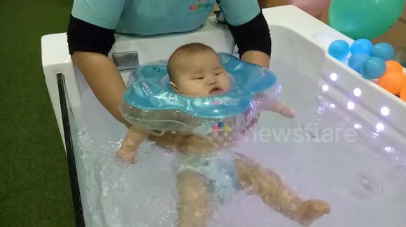 Newsflare Cute Chubby Baby Relaxing At Spa