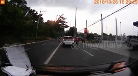 Car drifts into opposite lane and causes head-on crash
