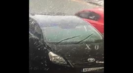 CAR ON ROAD WITHOUT A WHEEL