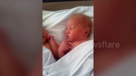 Parents of rare albino twins accused of having affairs