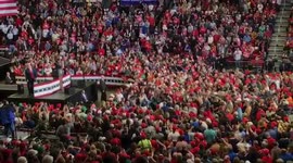 Trump pauses speech, crowd sings Amazing Grace during rally as elderly woman receives medical help