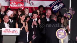 Menendez Hugs Supporters on Stage as Balloons Fall