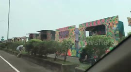 Drivers amazed by hundreds of puppet stands lined up along roadside