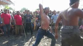Bizarre video of traditional Indonesian whip fighters engaging in battle to conjure rain