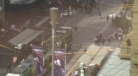 Plainclothes police sprint through central Melbourne to apprehend terrorist