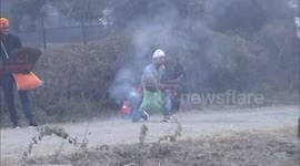 Crazy Indian festival shows people throwing fruit filled with gunpowder