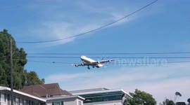 Plane Passing By Flying Low