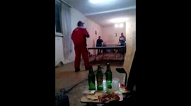 Drunk man plays table tennis