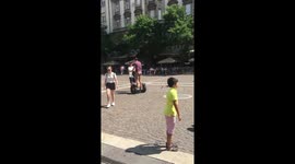 Runaway segway towards restaurant.