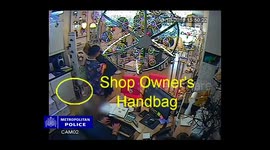 Women burgle lighting shop in front of owner