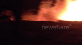 Man drives buggy through burning bonfire