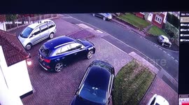 This is the shocking moment three brazen thieves make off with a £57,000 Audi SQ5 - after kicking in the front door to get the keys