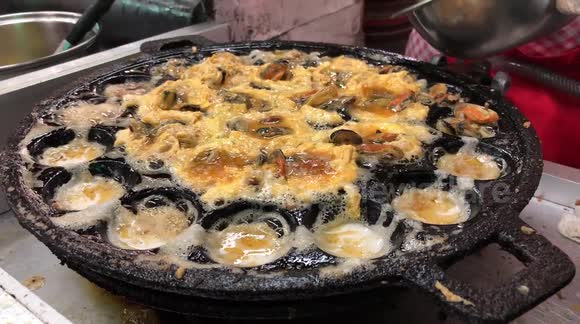 Thai Seafood dish being fried in a hot pan