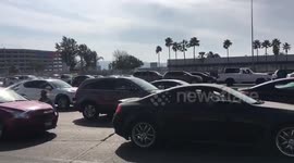 Scene right now at San Ysidro border crossing with the new extra barbed wire https://t.co/WBskpSA0I4