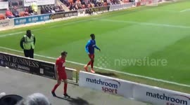Leyton Orient fan hilariously mocks opponent’s warmup routine on touch line