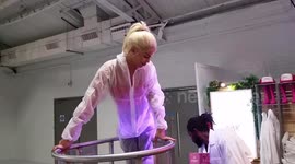 British model Talulah Eve takes part in berry-juicing challenge at Ideal Home Show Christmas