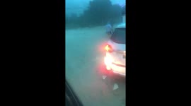 Drivers battle through flash floods in Vietnam