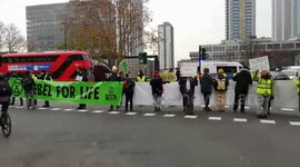 Angry commuter confronts climate activists blocking Elephant & Castle during rush hour