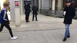 Armed police officers guard Christmas Fayre in Suffolk