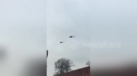 Helicopters filmed flying over Kremlin carrying unknown, 'human-shaped' cargo