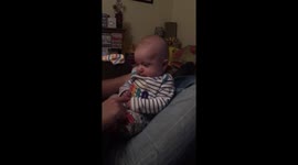 10-week-old baby's funny reaction when his dad makes him jump