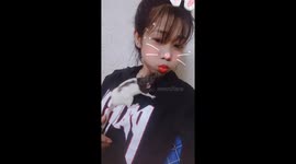 Girl goes for selfie but keeps getting interrupted by her mouse going for a kiss